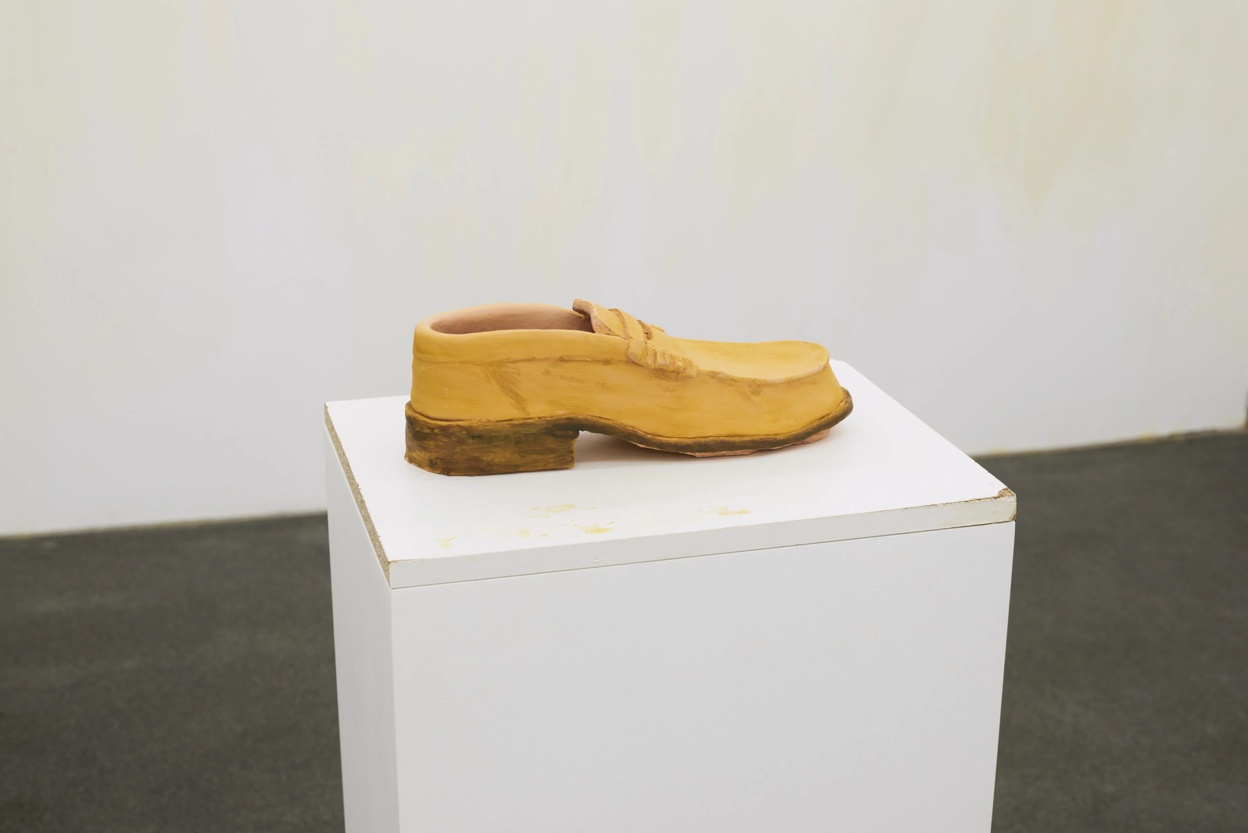 Dirty shoe, 2025 painted ceramics, found objects, painted mdf 130x29x13cm