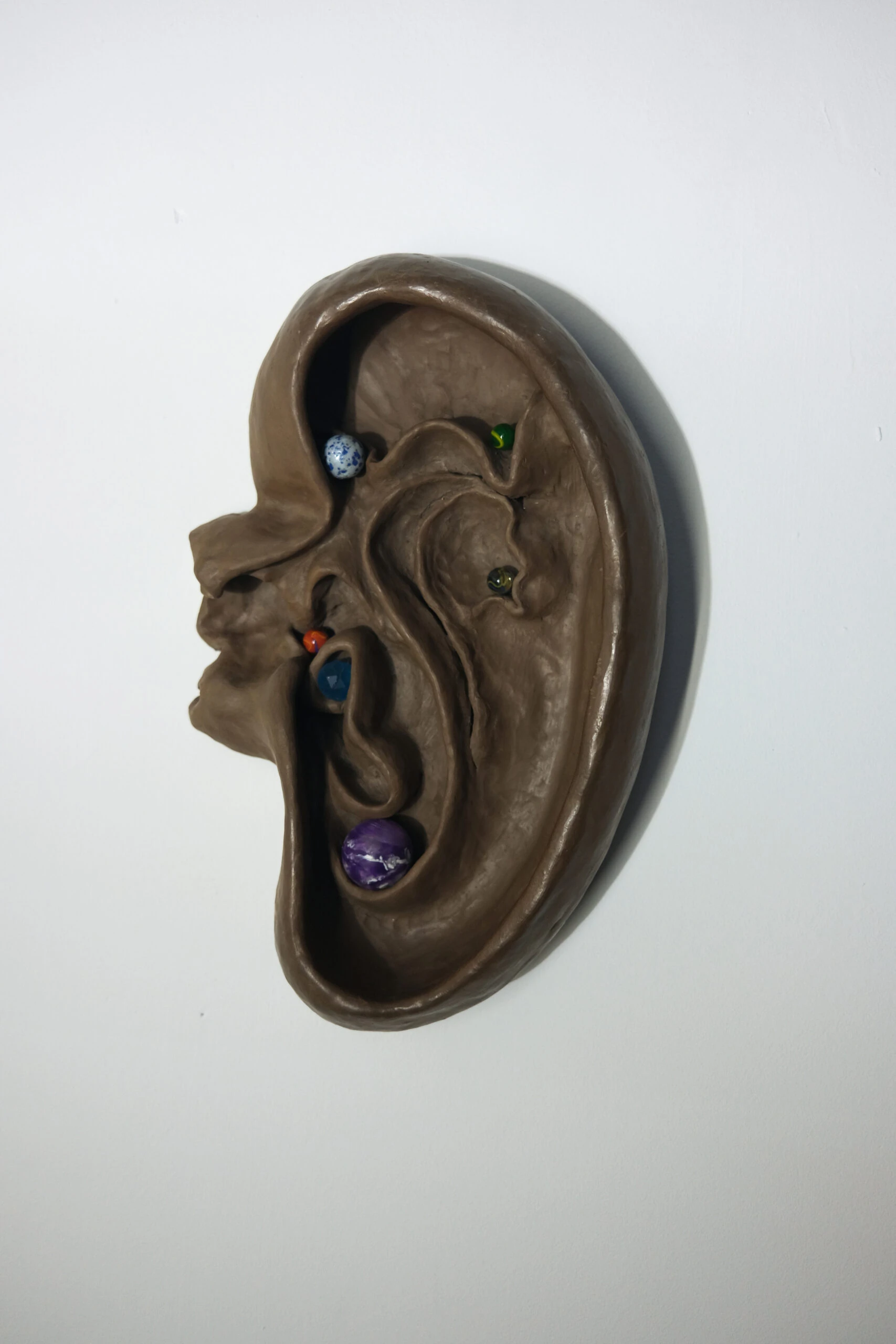 Rimrim, 2023, Faince and marbles 45x24,5x13 cm
